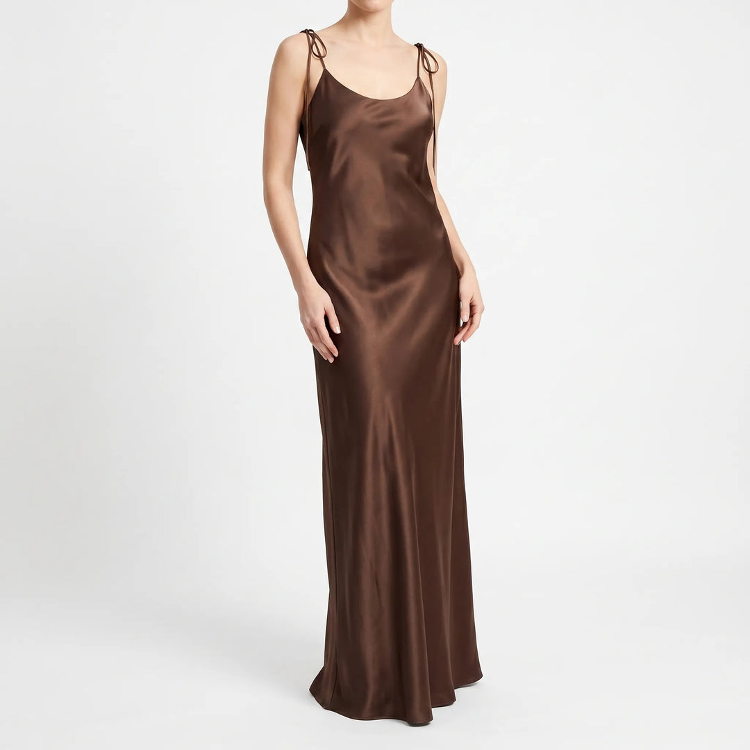 Simple yet elegant women's floor-length backless slip dress for sophisticated evening occasions.