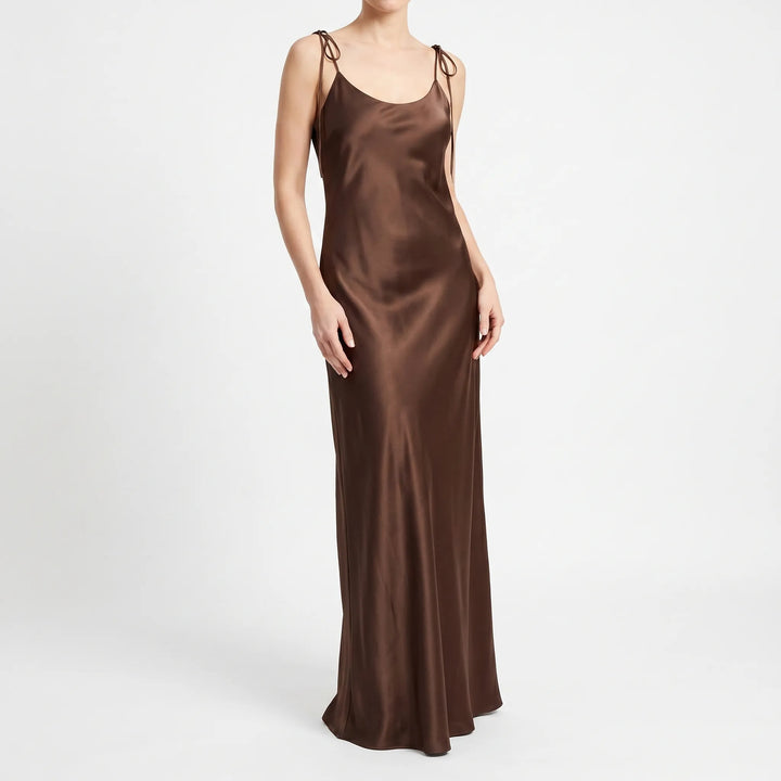 Simple yet elegant women's floor-length backless slip dress for sophisticated evening occasions.