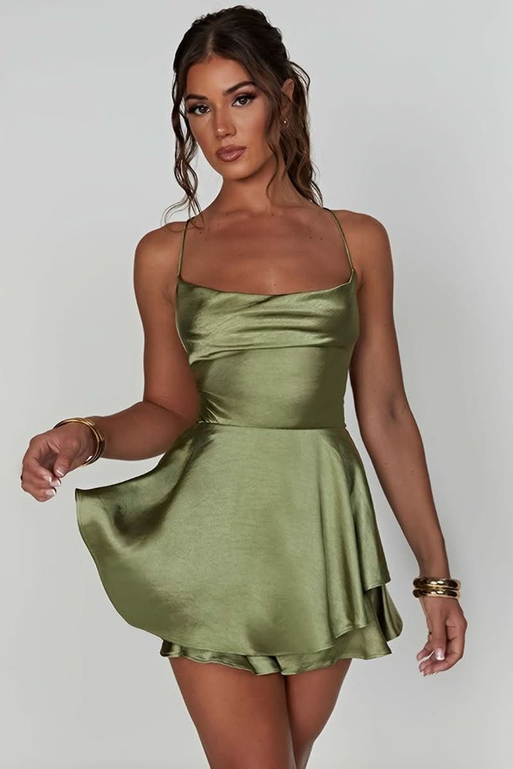 Party-ready women's backless halter dress, ruched detail, flattering for any event.