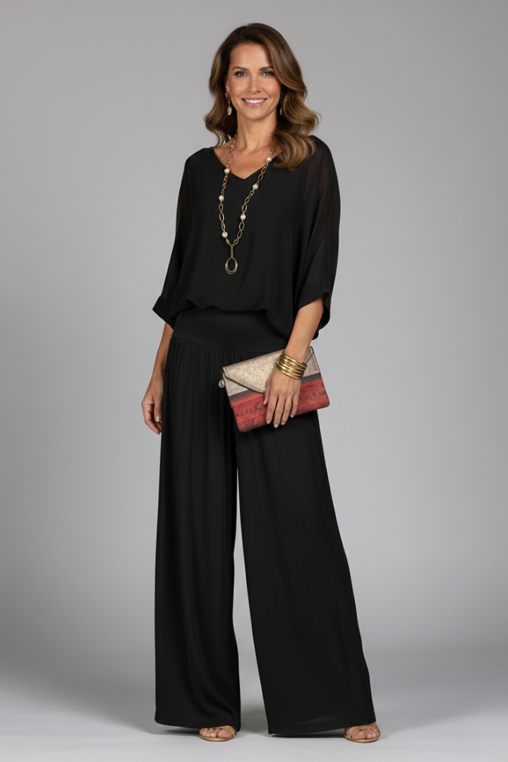 Chic women's matching batwing top & wide leg pant set, perfect for a dressy casual or evening look.