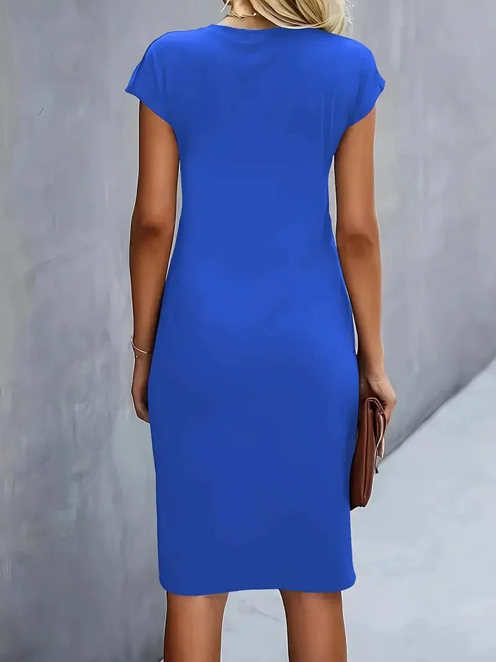 Elegant midi dress for women, classic round neck, timeless style, perfect for business casual.