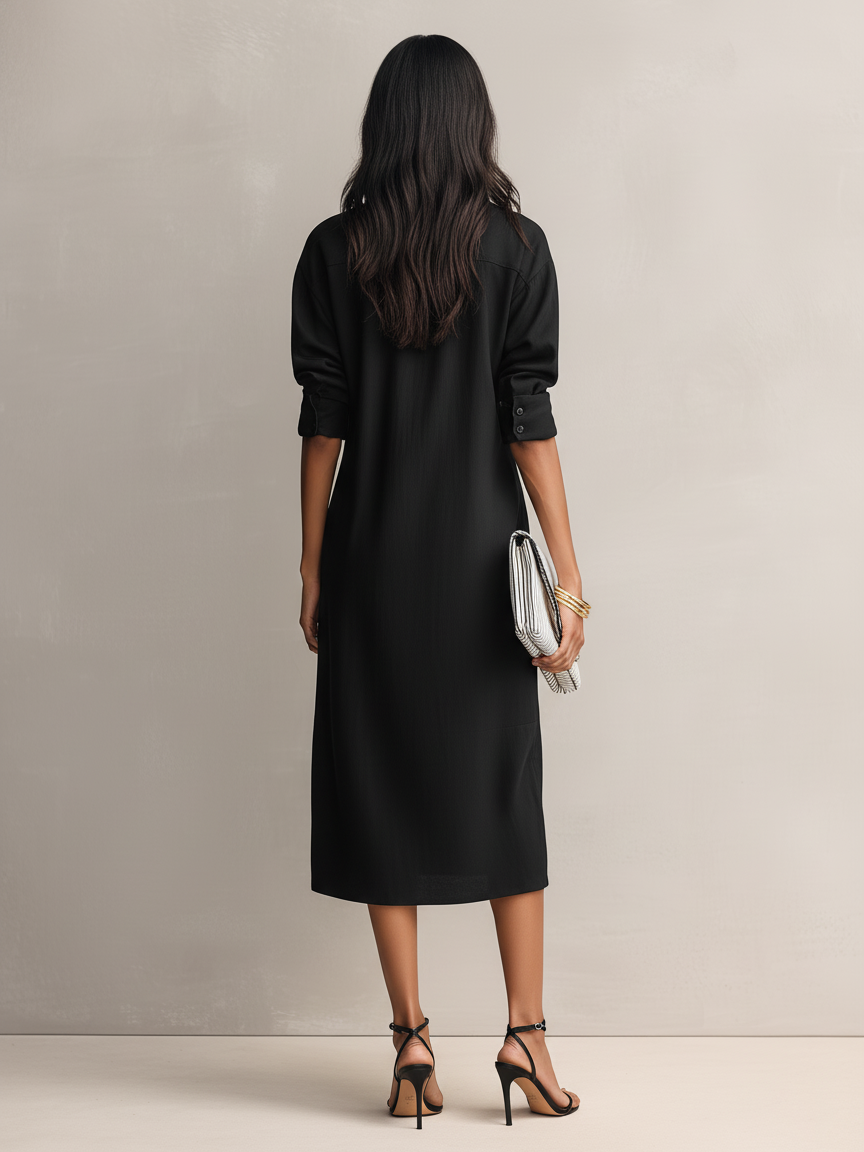 Sophisticated women's black midi dress featuring a classic shirt collar & comfy short sleeves for an elegant style.