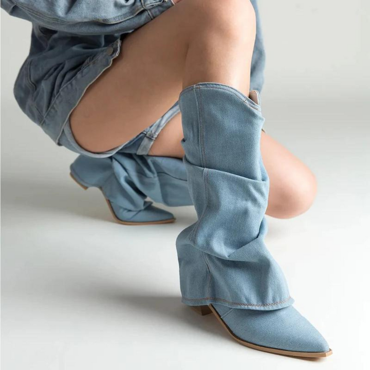 Elegant women's slip-on tall boots featuring a pleated design, pointed toe, & sturdy block heel.