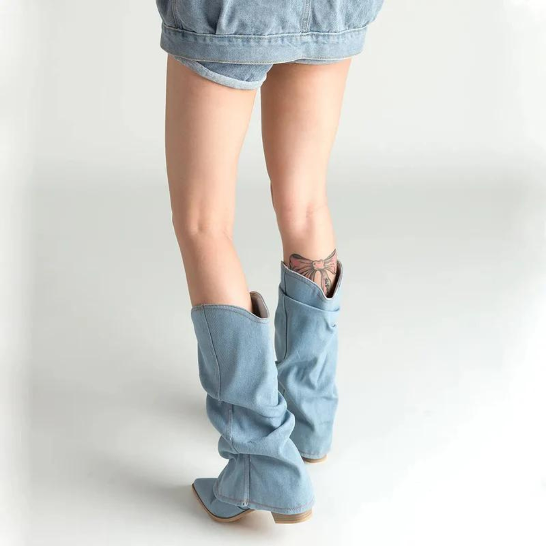 Sophisticated women's pleated block heel boots. Tall, pointed-toe design for an elegant silhouette.