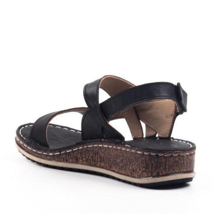 Stylish women's summer wedge sandals, combining elegance & comfort. Chic platform footwear.