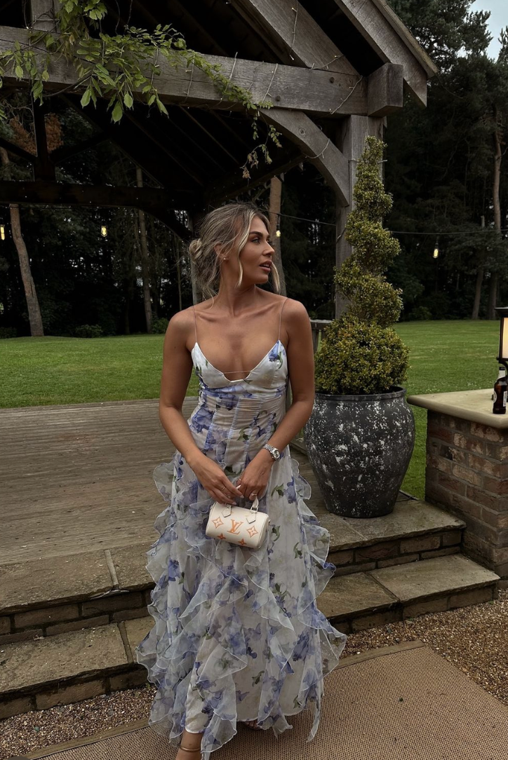 Floral corset ruffle maxi dress for women, a beautiful and elegant choice as a wedding guest or party dress.