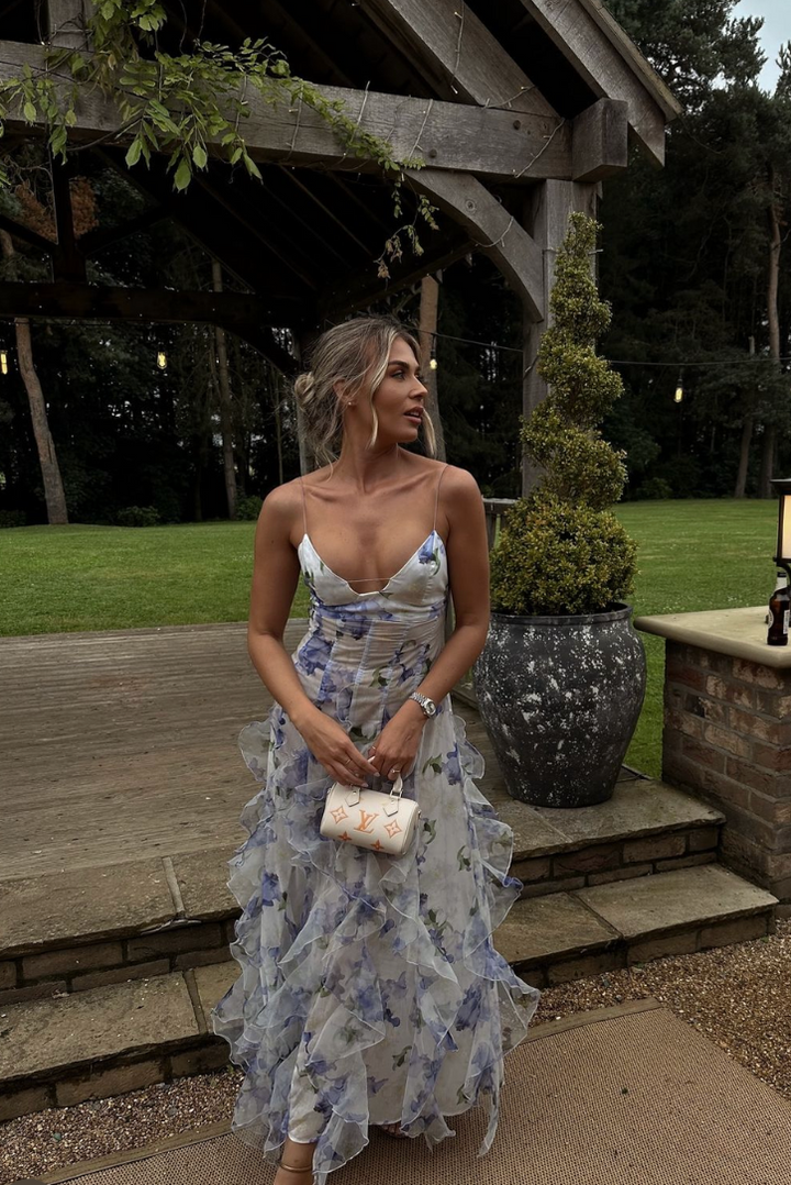 Floral corset ruffle maxi dress for women, a beautiful and elegant choice as a wedding guest or party dress.