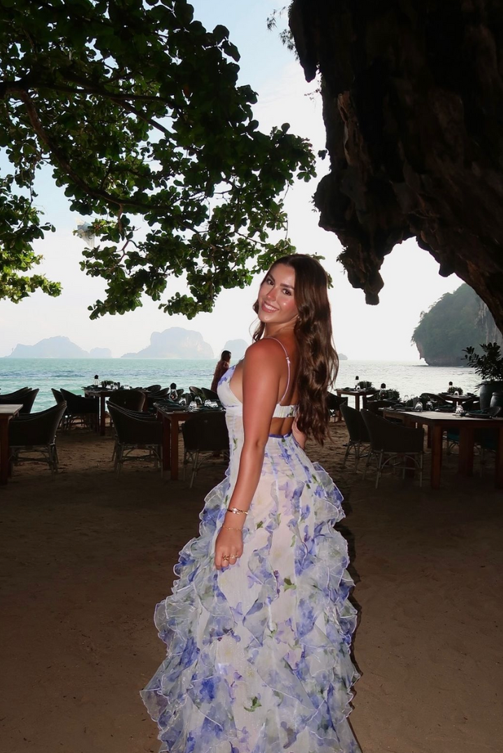 Long romantic floral maxi dress for women, with a chic corset design & elegant ruffles. Ideal for summer parties.