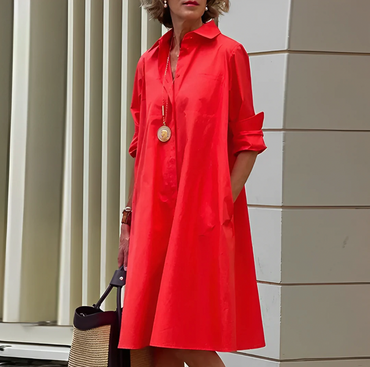 Women's elegant button-front mini shirt dress with a relaxed fit. Versatile for casual or smart-casual wear.
