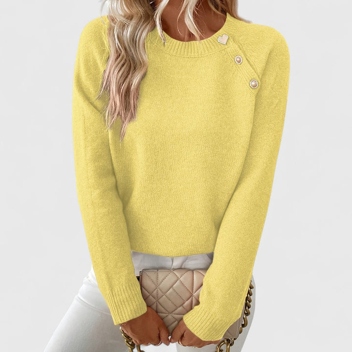 Refined women's crew neck sweater, long sleeve, with pearl button shoulder details for a chic style.