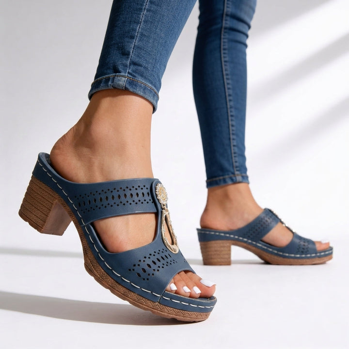 Comfortable women's platform block heel sandals with rhinestone T-strap, perfect for vacation or dressy occasions.