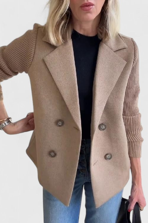Classic women's double-breasted blazer with comfort sleeves, tailored for professional office style.