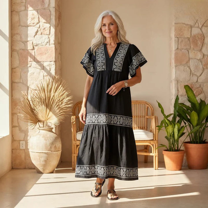 Women's elegant embroidered boho midi dress, A-line cut, perfect for spring summer casual or stylish wear.