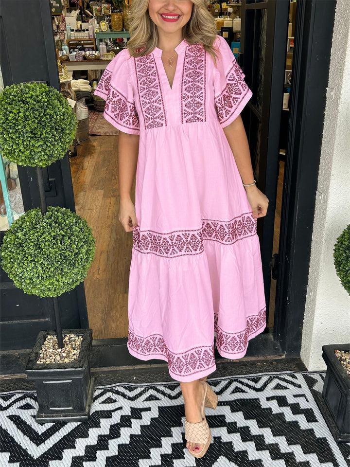 Chic women's boho midi dress with elegant embroidery, a versatile long sleeve choice for spring summer events.