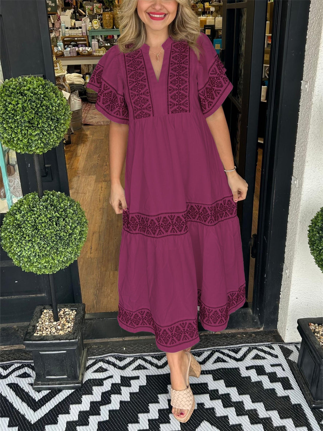 Elegant women's boho midi dress with intricate embroidery, a versatile long sleeve design for spring summer casual wear.