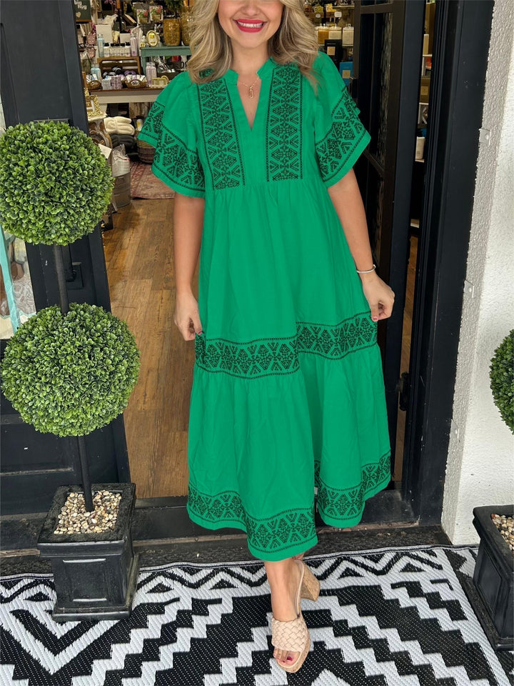 Women's elegant embroidered A-line boho midi dress. Bohemian fashion, perfect for spring/summer casual wear.