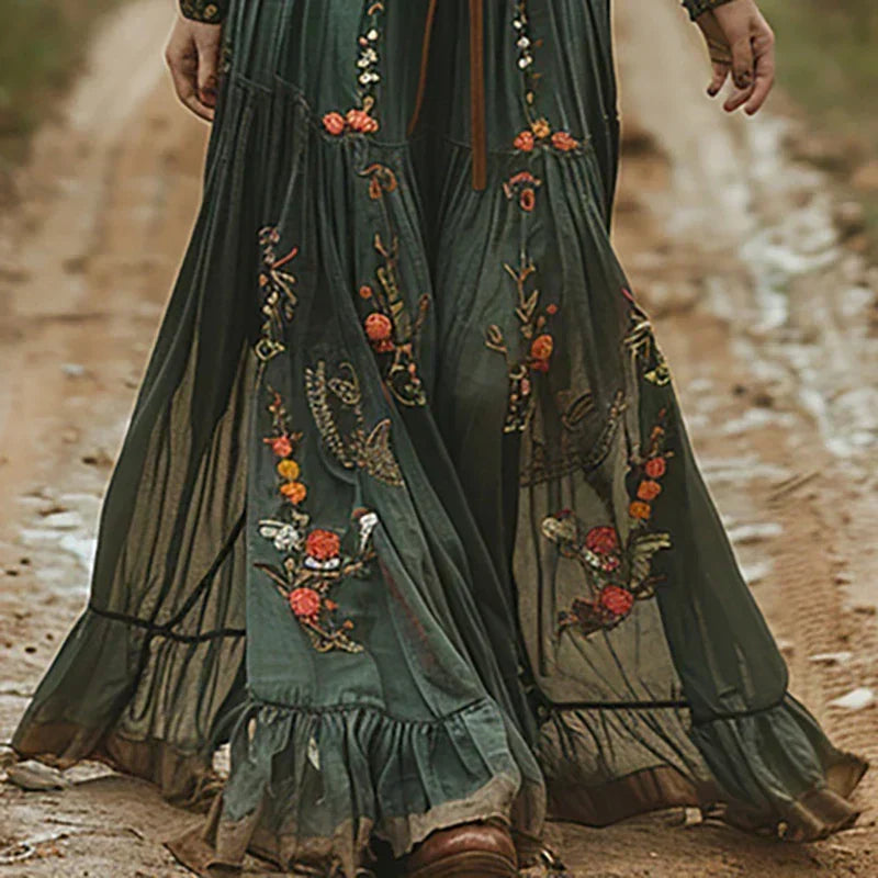 Intricately embroidered long sleeve boho maxi dress for women. Elegant, flowy, perfect for spring fashion.