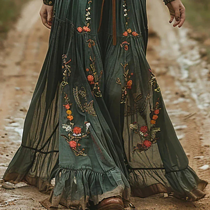 Intricately embroidered long sleeve boho maxi dress for women. Elegant, flowy, perfect for spring fashion.