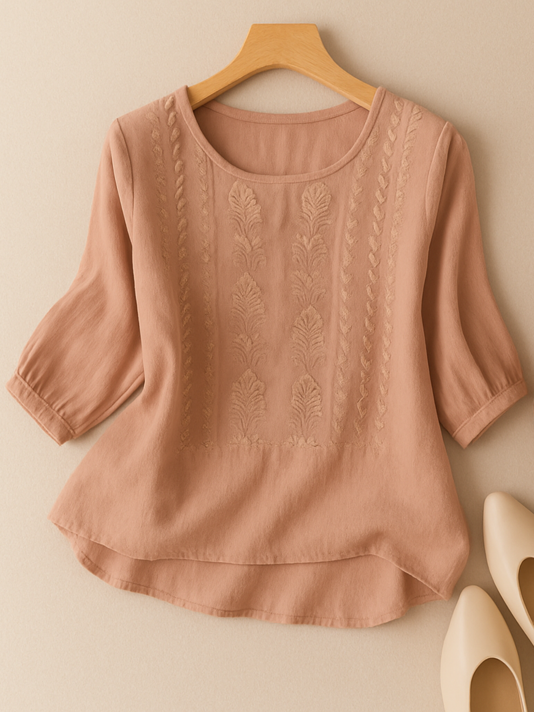 Relaxed fit women's blouse with elegant embroidery, perfect for comfortable daily wear and versatile fashion.