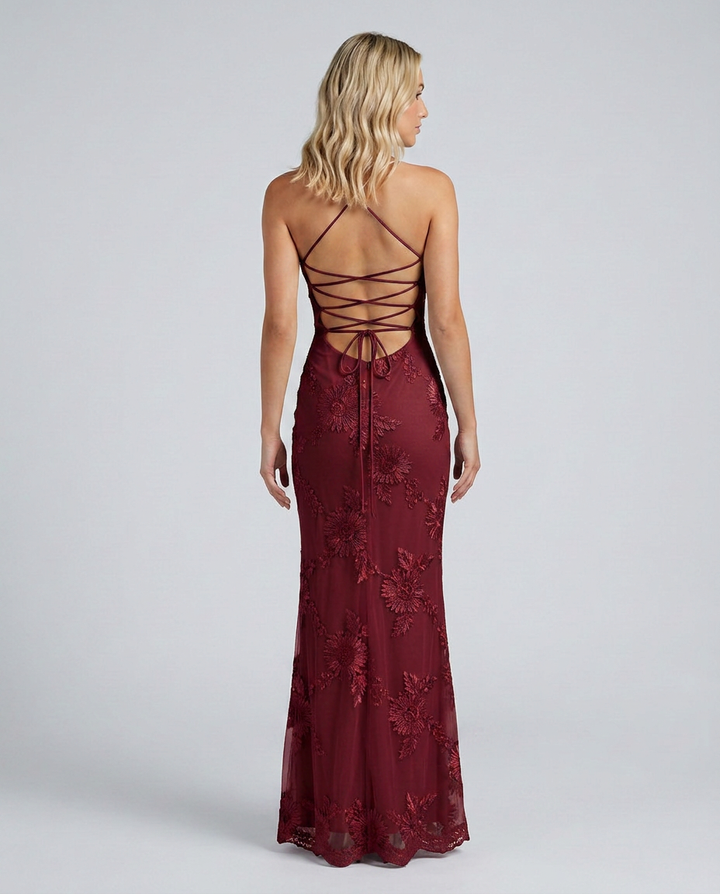 Gorgeous women's party dress, full floral appliqué & a trendy lace-up back, flattering fit.