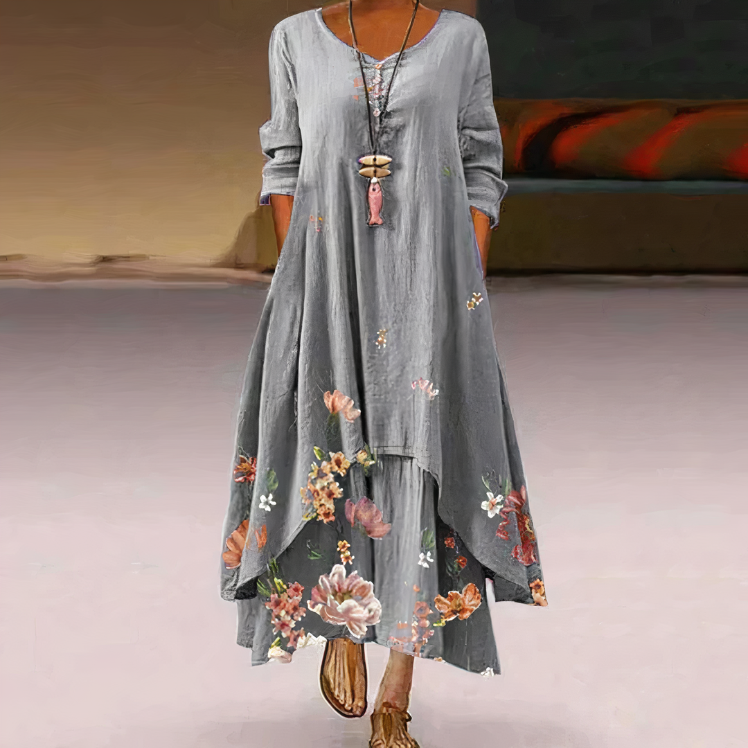 Comfortable women's long sleeve maxi dress, showcasing a unique floral border print. Versatile for casual or elegant looks.