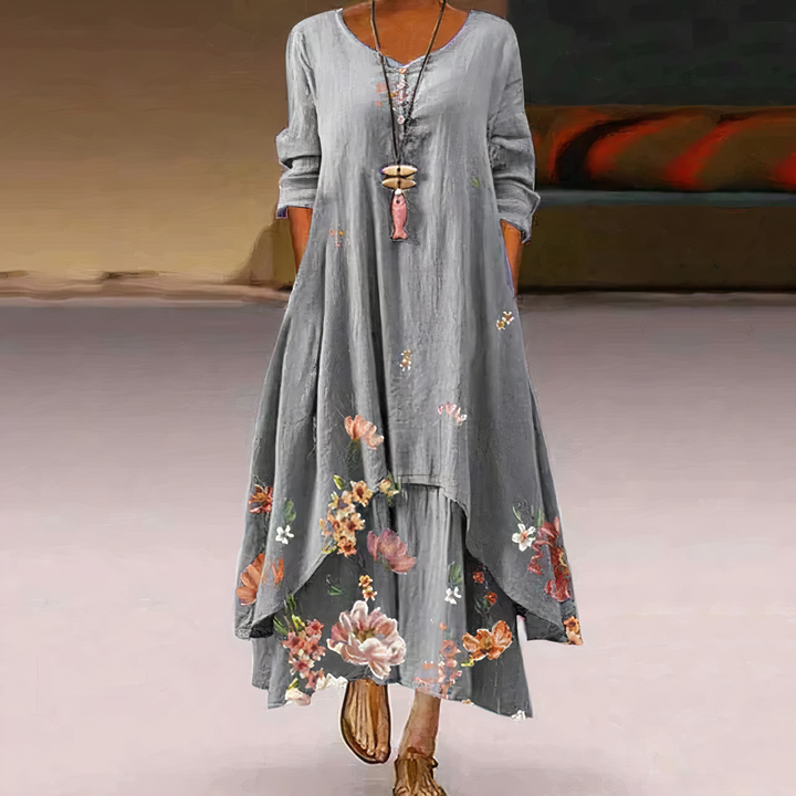 Comfortable women's long sleeve maxi dress, showcasing a unique floral border print. Versatile for casual or elegant looks.