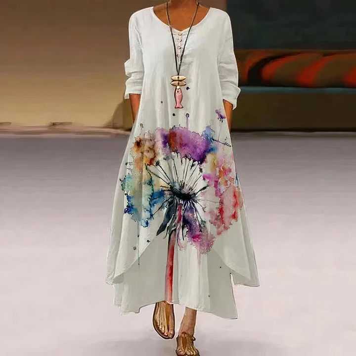 Womens fashion: flowy long sleeve maxi dress with an eye-catching floral border print. Perfect summer/spring outfit.