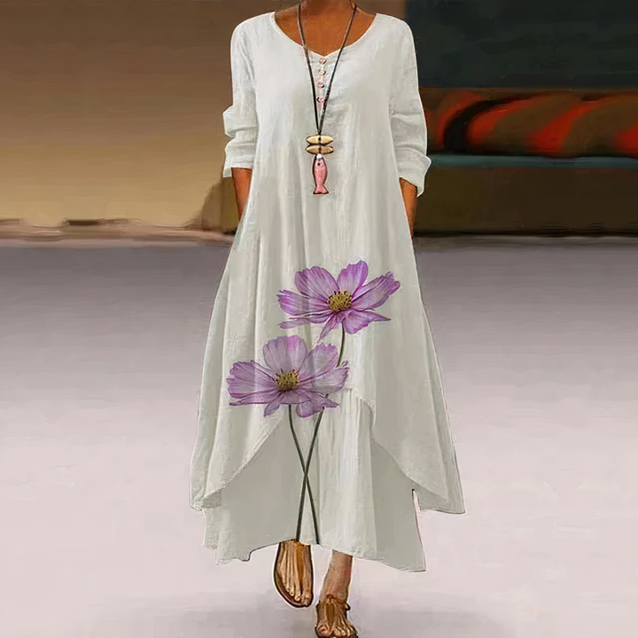 Versatile women's long sleeve maxi dress featuring a beautiful floral border print. Great for casual and elegant styles.