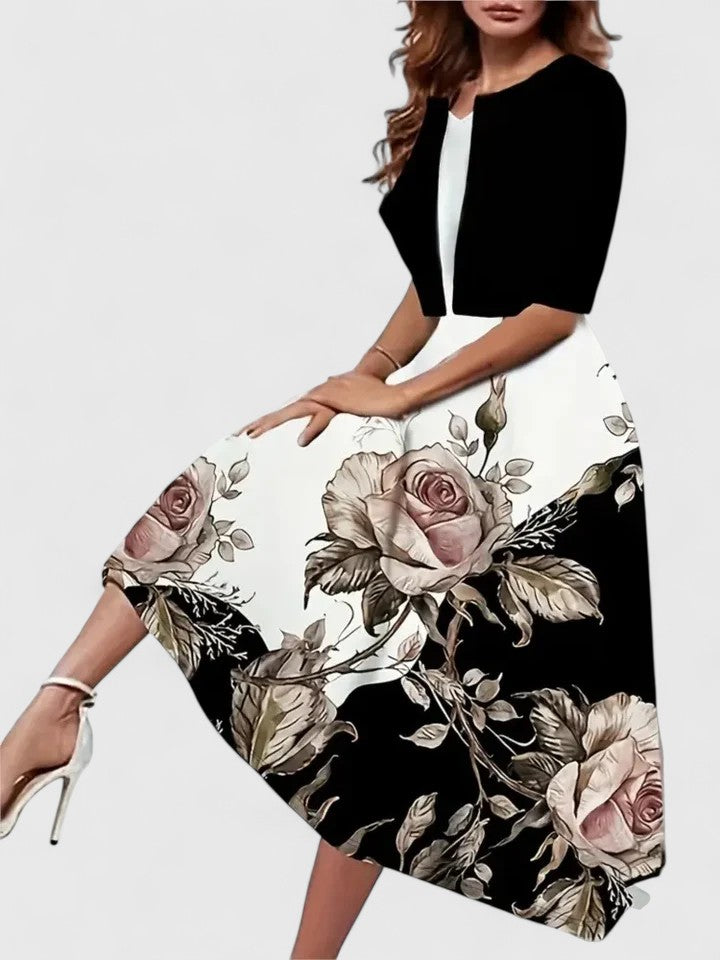 Women's sophisticated floral colorblock A-line midi dress. Ideal for formal or party wear.