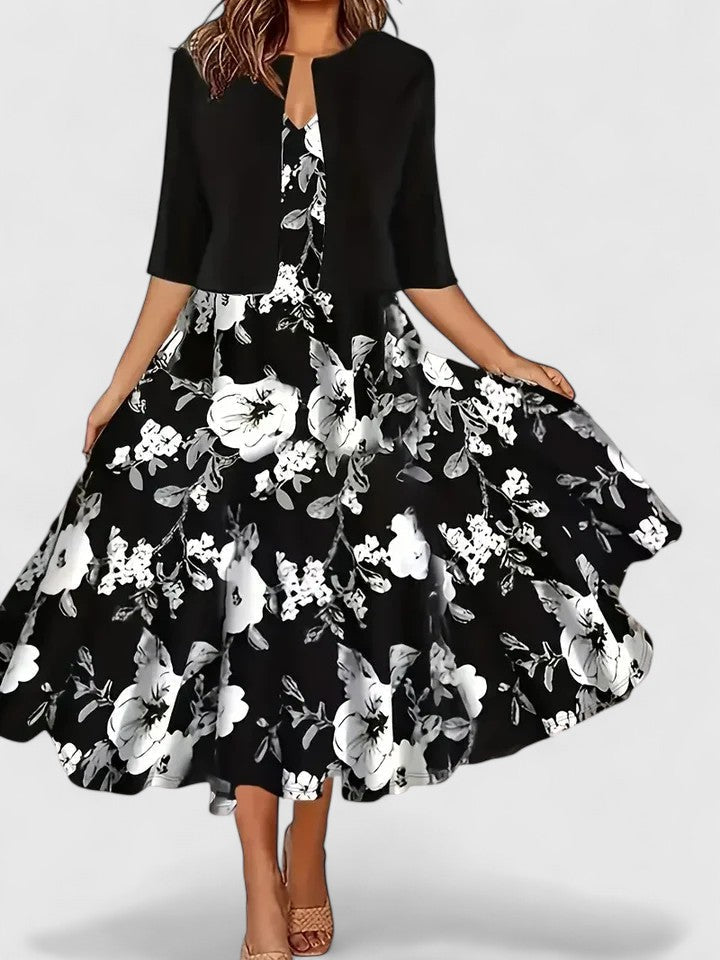Formal women's A-line midi dress with a unique notch neck, floral pattern & contrasting color blocks.