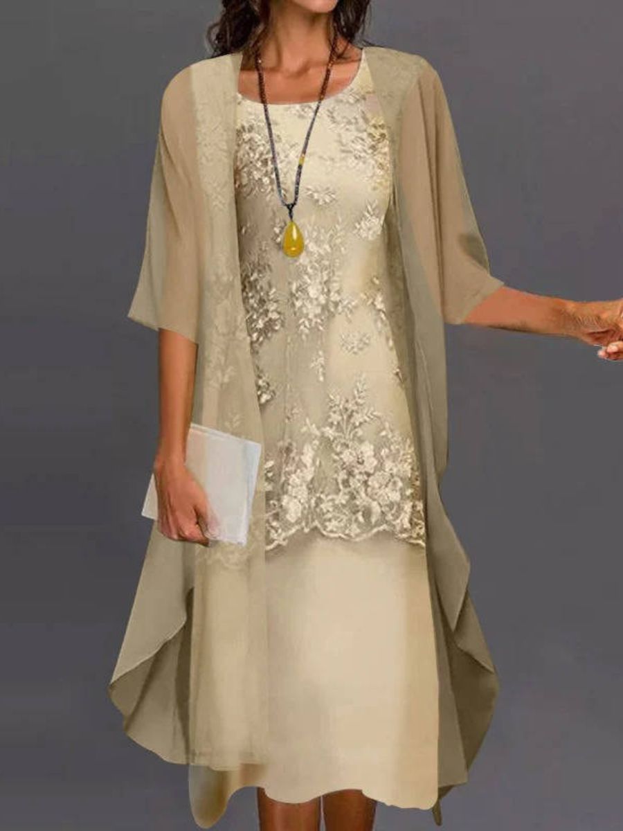 Chic women's floral embroidered asymmetrical midi dress for casual summer fashion or elegant vacation wear.