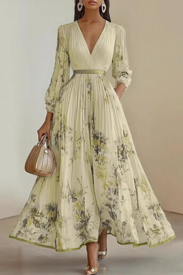 Flowy women's floral long sleeve maxi dress, pleated design, and V-neck for comfortable, elegant summer and spring wear.