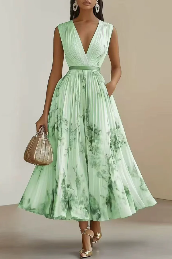 Women's V-neck floral long sleeve maxi dress for spring & summer. Elegant pleated flowy design, ideal for occasion wear.