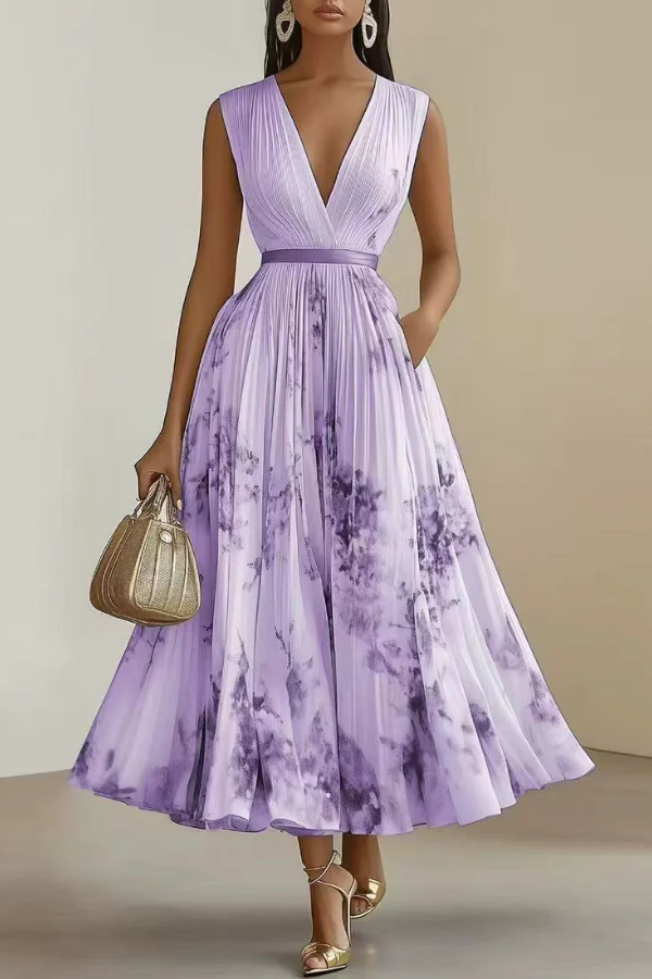 Beautiful women's floral long sleeve maxi dress with V-neck & pleated skirt. Versatile elegant dress for any occasion.