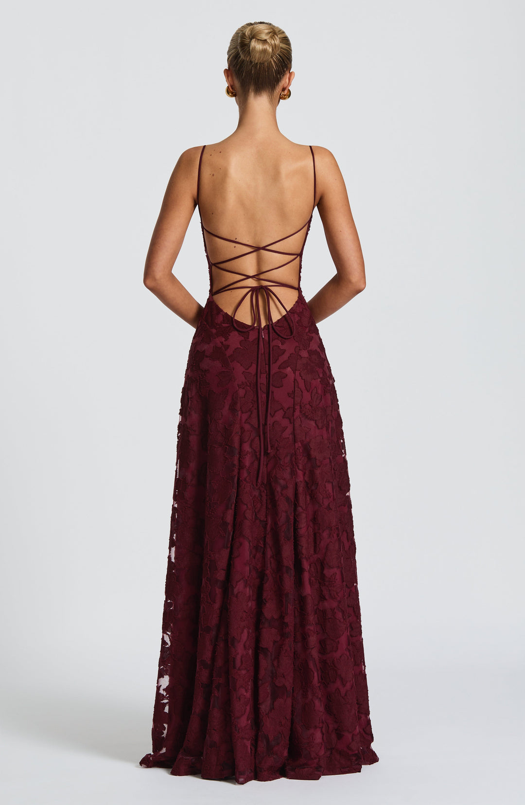 Women's elegant floral maxi dress for parties, featuring a sleeveless design, waterfall neckline & lace-up back.