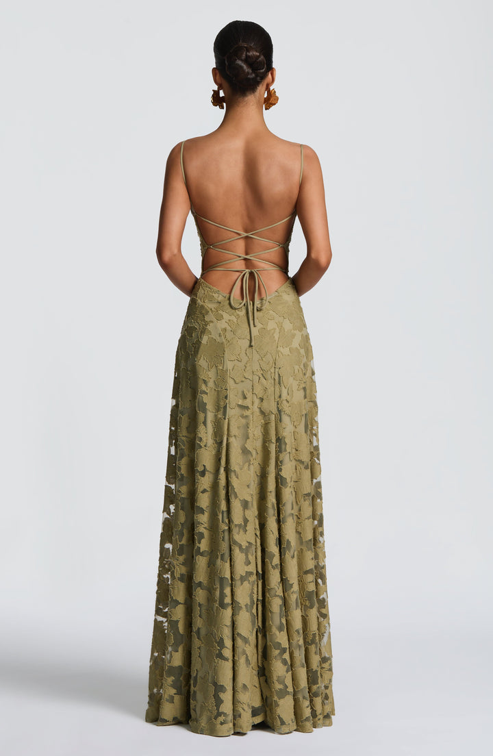 Flowy A-line floral maxi dress for women featuring a stylish waterfall neckline & sleeveless design.