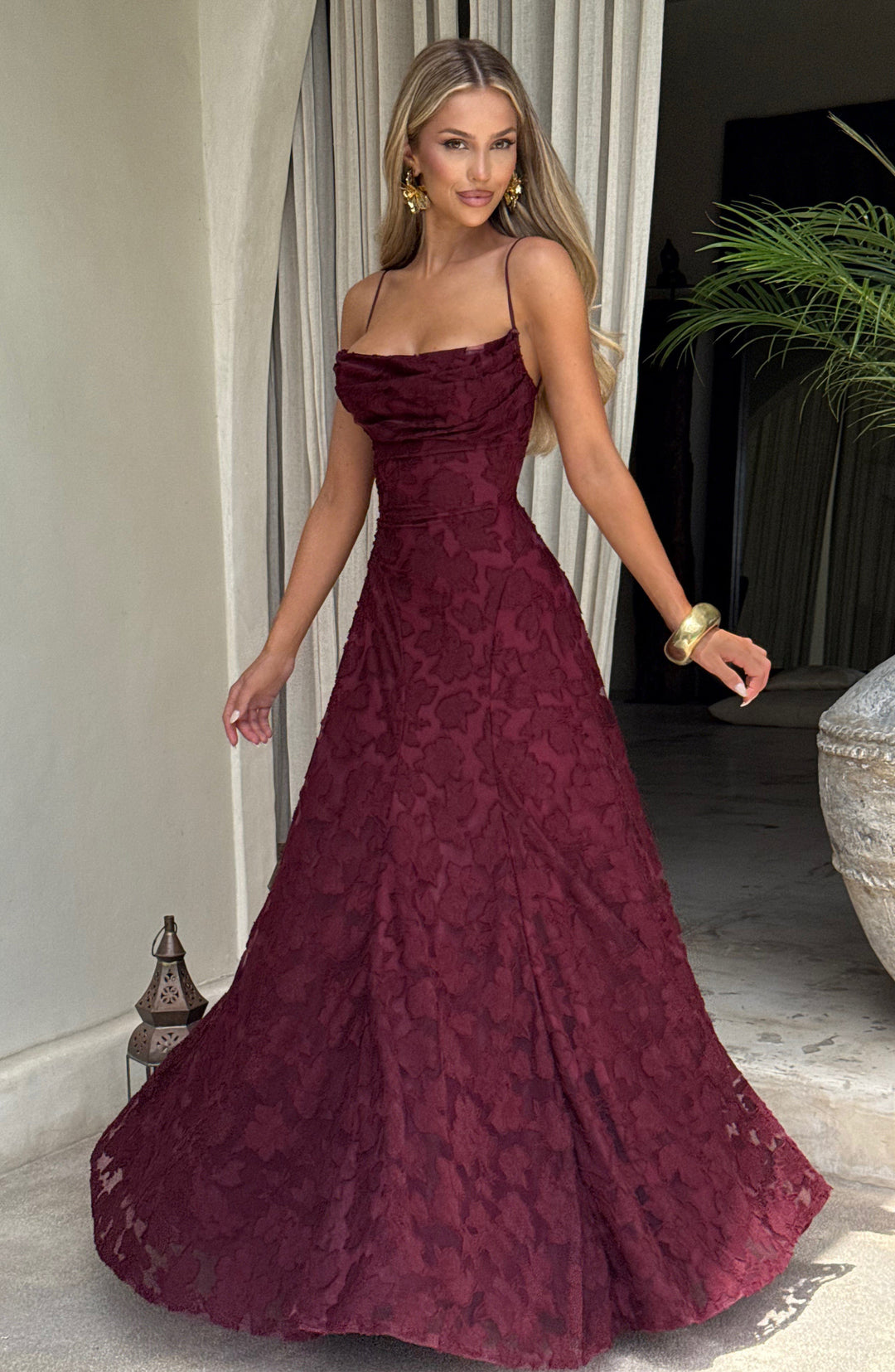 Women's stunning floral evening gown, a maxi dress with a beautiful waterfall neckline and flowy skirt.