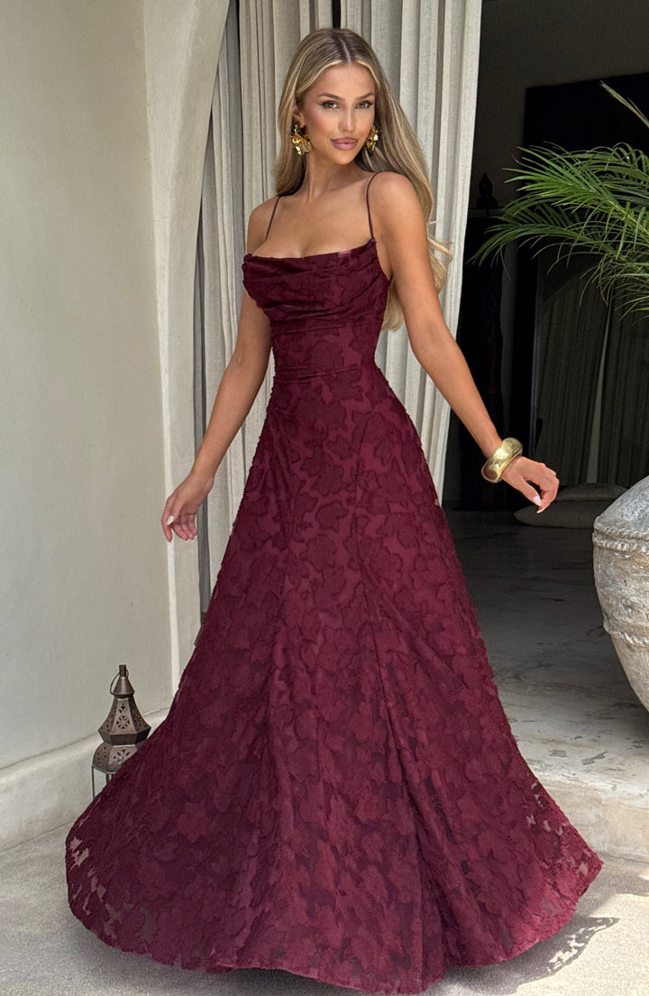 Women's stunning floral evening gown, a maxi dress with a beautiful waterfall neckline and flowy skirt.