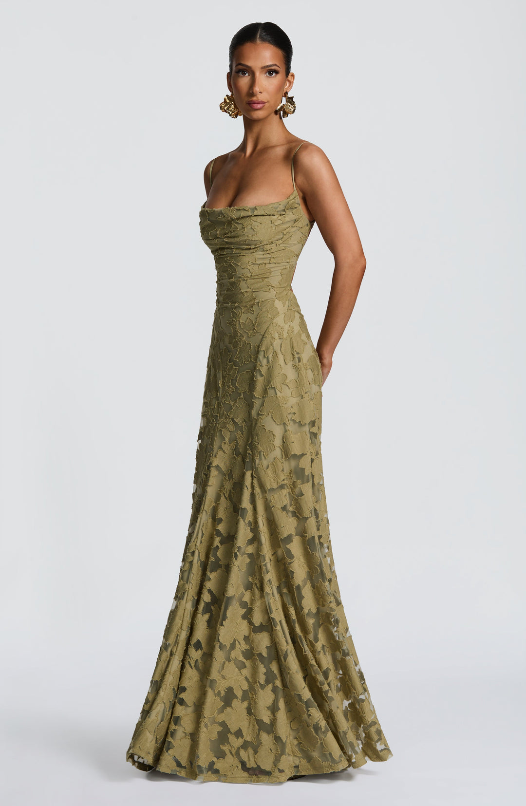 Sleeveless women's summer maxi dress in a vibrant floral print, designed with an elegant waterfall neckline.