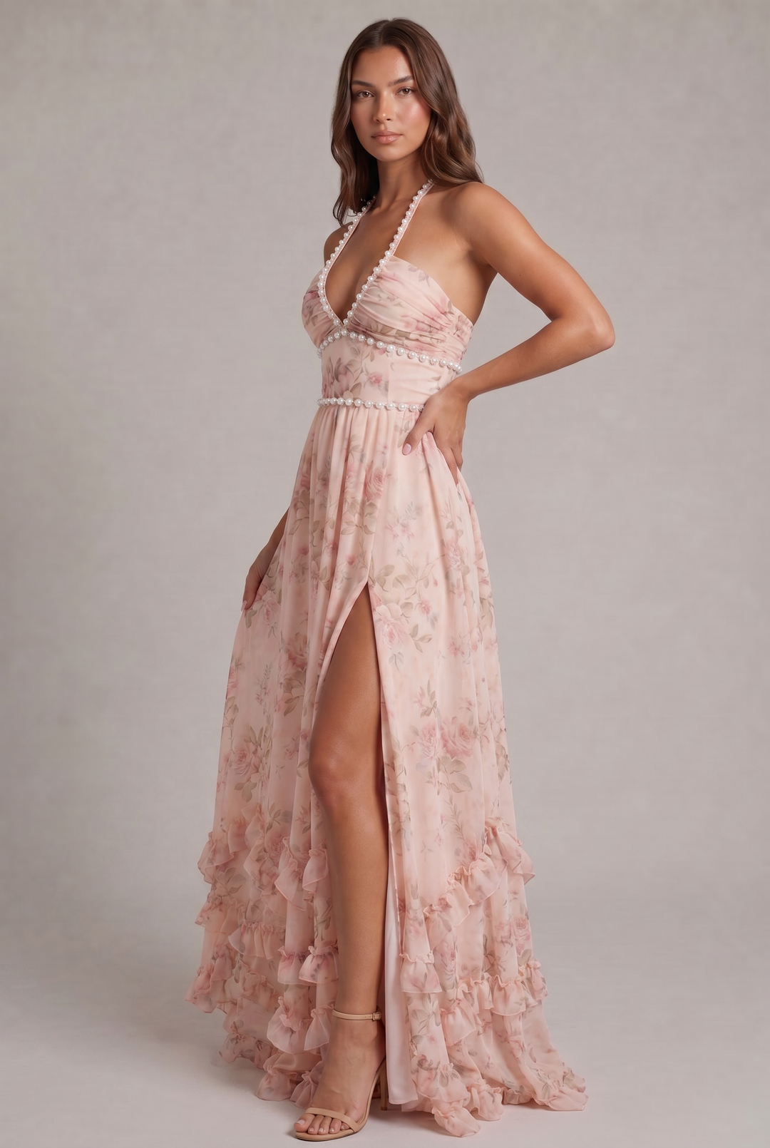 Flowy floral print maxi dress for women, featuring a chic halter neck. Ideal for summer evenings.