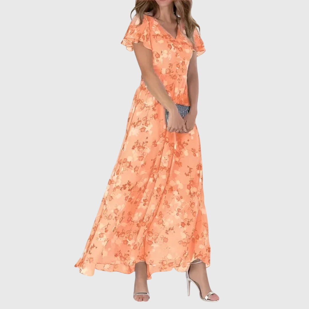Women's elegant floral maxi dress with V-neck, flutter sleeves. Perfect boho style for spring & summer occasions.
