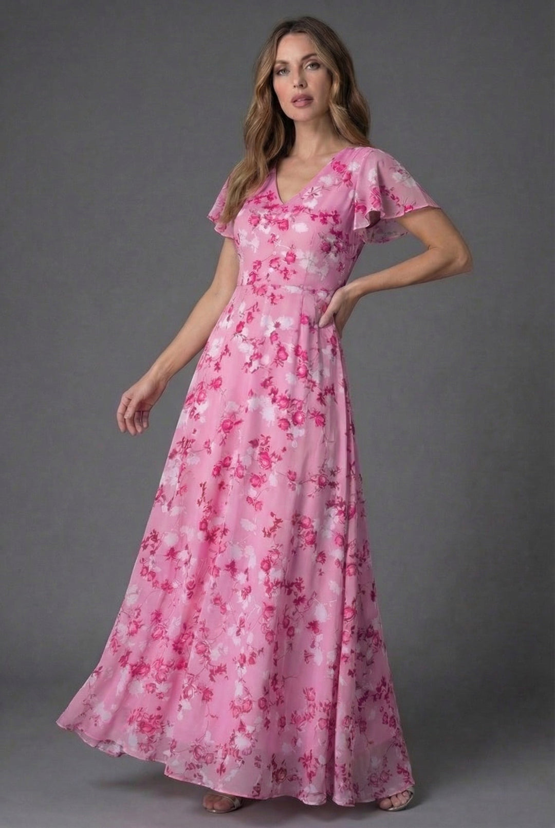 Women's floral V-neck maxi dress with flutter sleeves. Elegant long party gown, great for wedding guests.