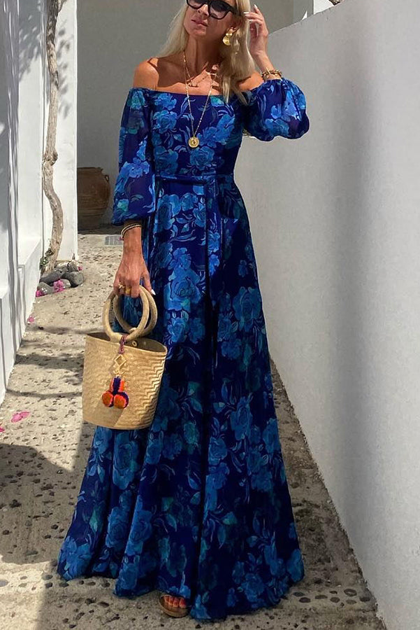 Casual blue floral off-shoulder flowy maxi dress for women. Ideal summer or evening attire with elegant details.