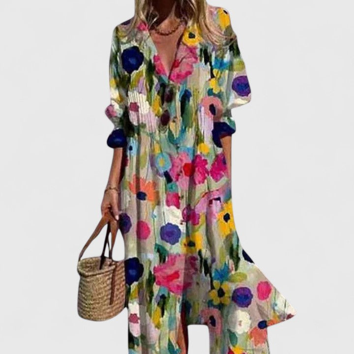 Flowy women's floral pleated midi dress, ideal as a casual summer dress. Button-down front & elegant design.