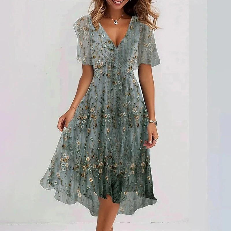 Women's summer occasion midi dress, featuring a wrap V-neck, flutter sleeves, and ruffle hem design.