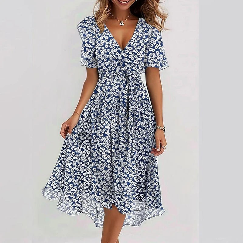 Stylish women's midi dress featuring a wrap V-neck, flutter sleeves, and a chic ruffle hem.