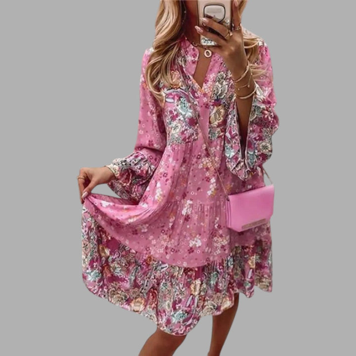 Women's elegant floral printed midi dress, perfect for summer parties & special occasions. Features a flowy silhouette.