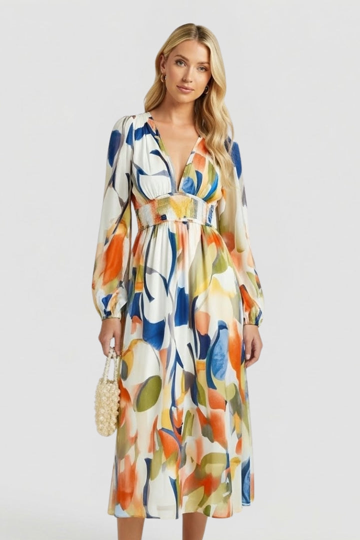 Stylish women's spring floral maxi dress, V-neck, long sleeve, elegant and flowy silhouette.