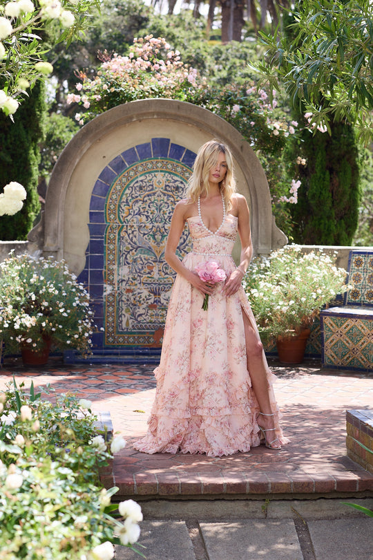 Women's vibrant floral V-neck ruffle maxi dress. Elegant and airy, perfect for special events.