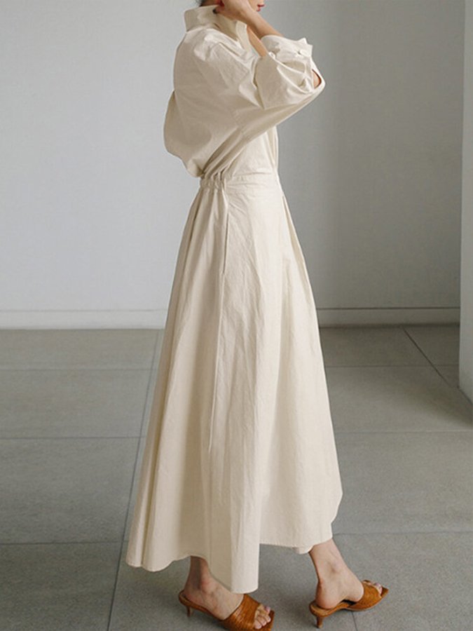 Sophisticated women's flowing maxi dress with elegant design, suitable for parties and formal occasions.